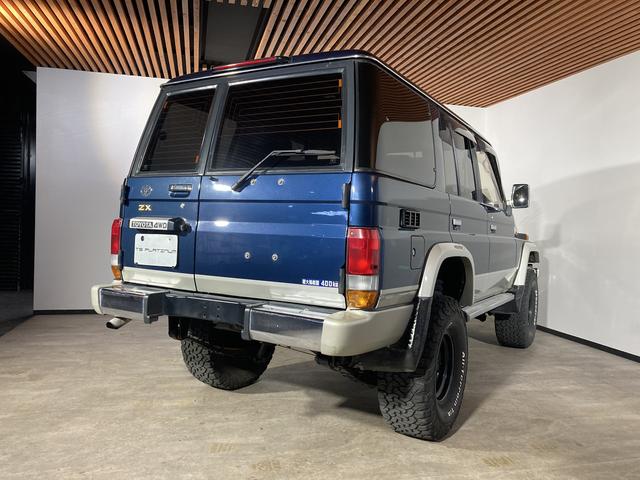 ランドクルーザー70（トヨタ）ZX 4WD サンルーフ ナビ