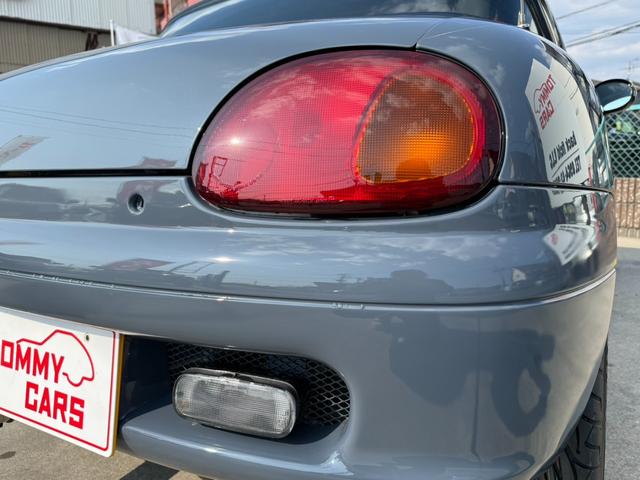 カプチーノ ベースグレード　ＮＩＳＭＯステルスグレー全塗装／新品アルミ＆新品タイヤ／ターボ／車検令和１０年１月まで／ライトスモーク加工ヘッドライト＆テールレンズ／５ＭＴ／オープンＴＯＰ／エアコン／レザーシート／（12枚目）