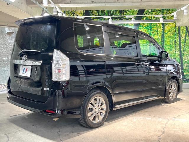 ヴォクシー ＺＳ　煌ＩＩ　両側電動ドア　ＨＤＤナビ　バックカメラ　禁煙車　スマートキー　ＨＩＤヘッド　ビルトインＥＴＣ　オートライト　オートエアコン　純正１６インチアルミ　Ｂｌｕｅｔｏｏｔｈ　フルセグ（18枚目）
