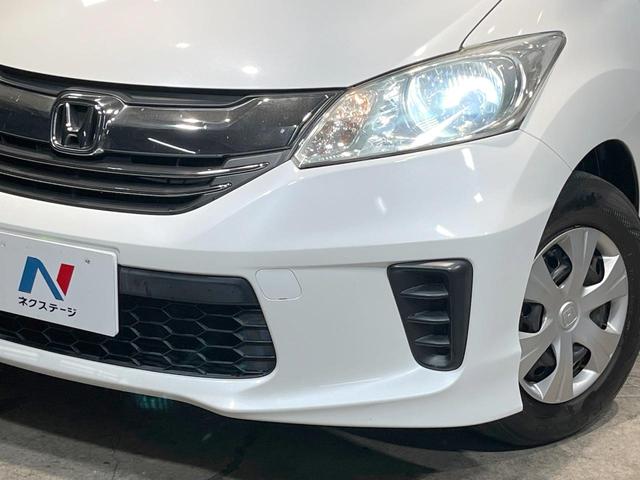 フリード G ジャストセレクション 電動スライドドア 純正SDナビ バックカメラ 禁煙車 スマートキー HIDヘッド ビルトインETC オートライト オートエアコン Bluetooth CD DVD再生 地デジ(13枚目)