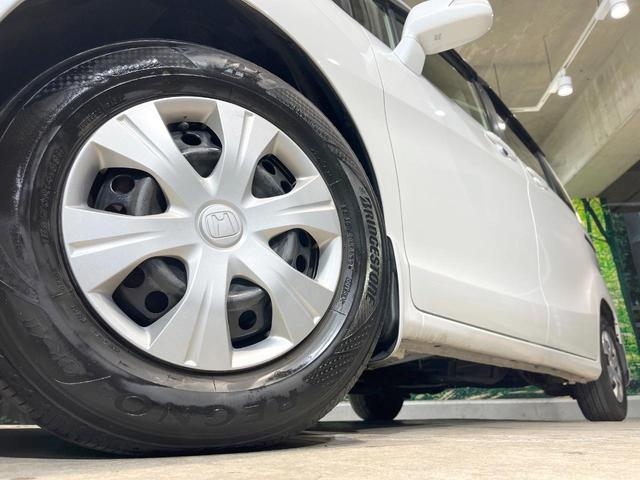 フリード G ジャストセレクション 電動スライドドア 純正SDナビ バックカメラ 禁煙車 スマートキー HIDヘッド ビルトインETC オートライト オートエアコン Bluetooth CD DVD再生 地デジ(14枚目)