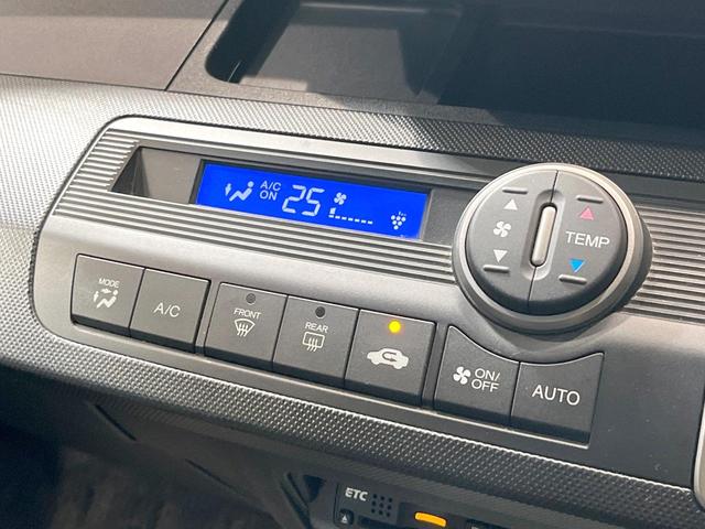 フリード G ジャストセレクション 電動スライドドア 純正SDナビ バックカメラ 禁煙車 スマートキー HIDヘッド ビルトインETC オートライト オートエアコン Bluetooth CD DVD再生 地デジ(27枚目)