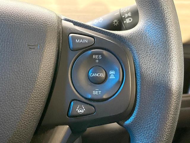 フリード Ｇ・ホンダセンシング　禁煙車　純正ナビ　フリップダウンモニター　バックカメラ　両側パワースライドドア　ホンダセンシング　アダプティブクルーズコントロール　オートエアコン　ＥＴＣ　横滑り防止　スマートキー（8枚目）