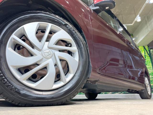 フリード Ｇ・ホンダセンシング　禁煙車　純正ナビ　フリップダウンモニター　バックカメラ　両側パワースライドドア　ホンダセンシング　アダプティブクルーズコントロール　オートエアコン　ＥＴＣ　横滑り防止　スマートキー（15枚目）