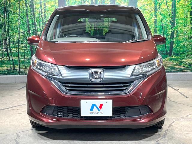 フリード Ｇ・ホンダセンシング　禁煙車　純正ナビ　フリップダウンモニター　バックカメラ　両側パワースライドドア　ホンダセンシング　アダプティブクルーズコントロール　オートエアコン　ＥＴＣ　横滑り防止　スマートキー（16枚目）