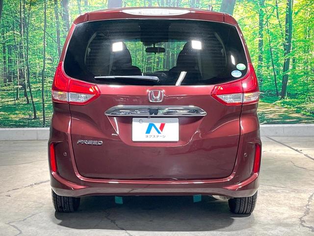 フリード Ｇ・ホンダセンシング　禁煙車　純正ナビ　フリップダウンモニター　バックカメラ　両側パワースライドドア　ホンダセンシング　アダプティブクルーズコントロール　オートエアコン　ＥＴＣ　横滑り防止　スマートキー（17枚目）