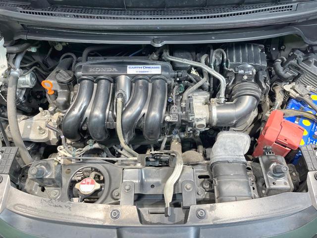 フリード Ｇ・ホンダセンシング　禁煙車　純正ナビ　フリップダウンモニター　バックカメラ　両側パワースライドドア　ホンダセンシング　アダプティブクルーズコントロール　オートエアコン　ＥＴＣ　横滑り防止　スマートキー（20枚目）