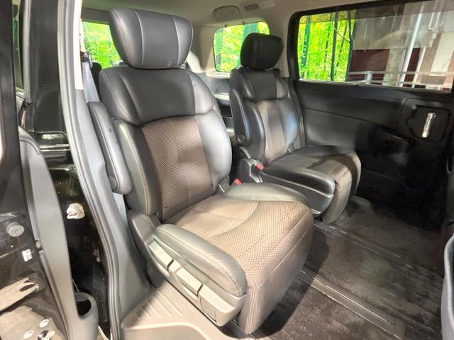 エルグランド ２５０ハイウェイスターアーバンクロム　禁煙車　両側電動スライドドア　ナビ　後席モニター　バックカメラ　ハーフレザーシート　スマートキー　ＨＩＤヘッド　ＥＴＣ　純正１８インチアルミ　オートライト　デュアルエアコン　リアエアコン（10枚目）