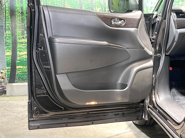 エルグランド ２５０ハイウェイスターアーバンクロム　禁煙車　両側電動スライドドア　ナビ　後席モニター　バックカメラ　ハーフレザーシート　スマートキー　ＨＩＤヘッド　ＥＴＣ　純正１８インチアルミ　オートライト　デュアルエアコン　リアエアコン（58枚目）