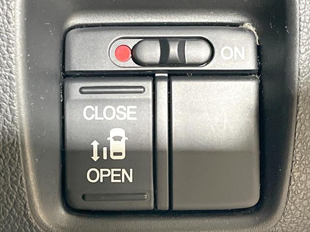 Ｎ－ＢＯＸカスタム Ｇ・Ａパッケージ　電動スライドドア　純正ＳＤナビ　バックカメラ　禁煙車　コーナーセンサー　スマートキー　ＨＩＤヘッドイエローフォグランプ　ＥＴＣ　純正１４インチアルミ　オートエアコン　ＣＤ　ＤＶＤ再生　フルセグ（7枚目）