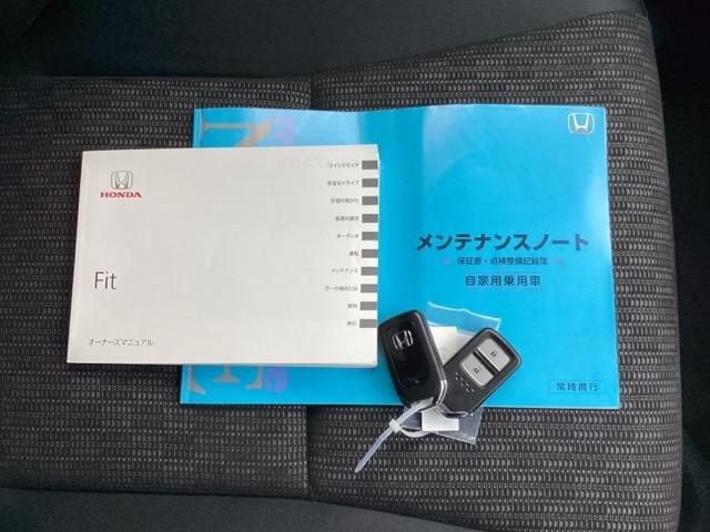 フィット １３Ｇ・Ｆパッケージ　Ｆパッケージ　フルオートエアコンディショナー　イモビ　スマ－トキ－　記録簿有り　ＶＳＡ　助手席エアバッグ　ＵＳＢ接続　エアバック　ＰＳ　キ－フリ－　ＰＷ　ＡＢＳ　アイドリングＳＴＯＰ（20枚目）
