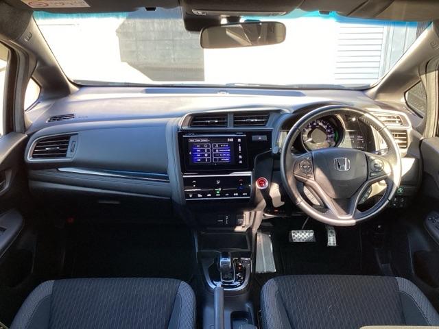 フィットハイブリッド Sホンダセンシング ETC/純正ナビ/バックモニター/ホンダセンシング スマ-トキ- ナビTV アクティブクルーズコントロール パワーウインドウ サイドエアバック DVD再生 パワーステアリング 整備記録簿 ABS(2枚目)