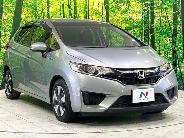 フィットハイブリッド Ｌパッケージ　禁煙車　純正ナビ　バックカメラ　衝突軽減装置　ハーフレザーシート　ＥＴＣ　Ｂｌｕｅｔｏｏｔｈ　フルセグ　ドラレコ　コーナーセンサー　スマートキー　ＬＥＤヘッド　クルコン　電動格納ミラー（16枚目）