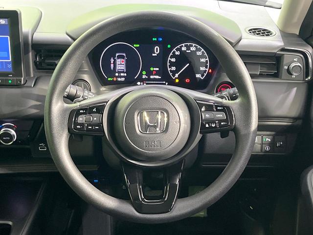 ヴェゼル ｅ：ＨＥＶ　Ｘ　禁煙車　純正９型ナビ　バックカメラ　衝突軽減装置　レーダークルーズ　ＥＴＣ　ドラレコ　Ｂｌｕｅｔｏｏｔｈ　クリアランスソナー　ＬＥＤヘッド　純正１６インチアルミ　ブレーキホールド　ステアリングスイッチ（11枚目）