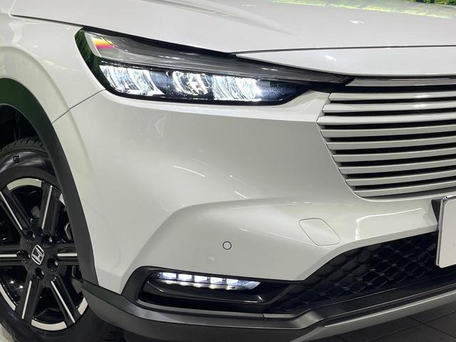 ヴェゼル ｅ：ＨＥＶ　Ｘ　禁煙車　純正９型ナビ　バックカメラ　衝突軽減装置　レーダークルーズ　ＥＴＣ　ドラレコ　Ｂｌｕｅｔｏｏｔｈ　クリアランスソナー　ＬＥＤヘッド　純正１６インチアルミ　ブレーキホールド　ステアリングスイッチ（12枚目）