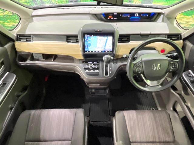 フリード G・ホンダセンシング 禁煙車 純正ナビ 後席モニター 両側電動スライドドア 衝突軽減装置 バックカメラ レーダークルーズ ETC Bluetooth フルセグ スマートキー LEDヘッド レーンアシスト オートエアコン(2枚目)