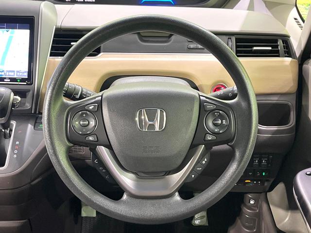 フリード G・ホンダセンシング 禁煙車 純正ナビ 後席モニター 両側電動スライドドア 衝突軽減装置 バックカメラ レーダークルーズ ETC Bluetooth フルセグ スマートキー LEDヘッド レーンアシスト オートエアコン(12枚目)