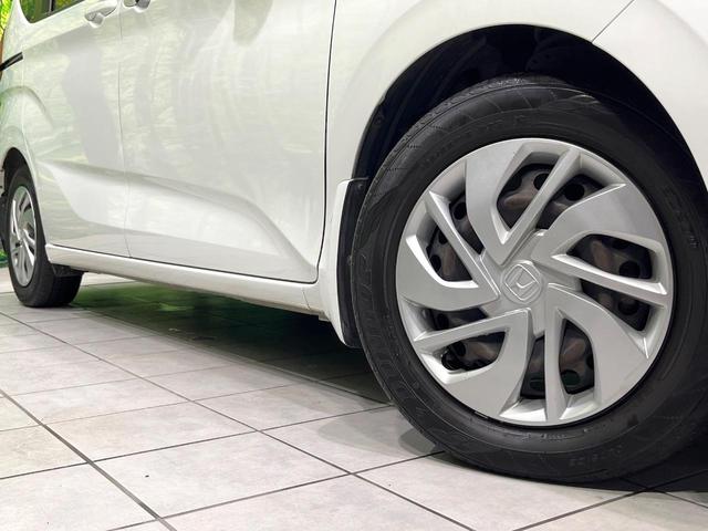 フリード G・ホンダセンシング 禁煙車 純正ナビ 後席モニター 両側電動スライドドア 衝突軽減装置 バックカメラ レーダークルーズ ETC Bluetooth フルセグ スマートキー LEDヘッド レーンアシスト オートエアコン(14枚目)