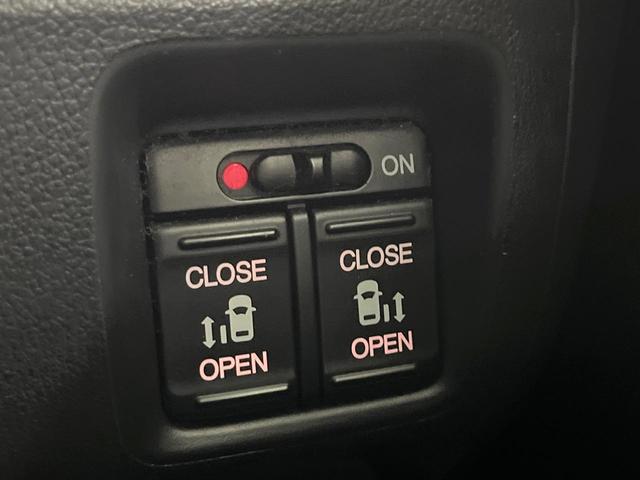 N-BOXカスタム G・Lパッケージ 禁煙車 純正ナビ バックカメラ 両側電動スライド デジタルインナーミラー ETC HIDヘッド 純正14インチアルミ スマートキー オートライト オートエアコン ステアリングスイッチ 横滑り防止装置(5枚目)