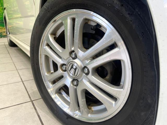 N-BOXカスタム G・Lパッケージ 禁煙車 純正ナビ バックカメラ 両側電動スライド デジタルインナーミラー ETC HIDヘッド 純正14インチアルミ スマートキー オートライト オートエアコン ステアリングスイッチ 横滑り防止装置(13枚目)