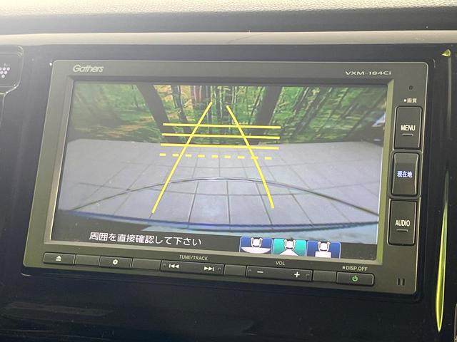 N-WGN G・Lパッケージ 禁煙車 純正ナビ バックカメラ ETC Bluetooth スマートキー オートエアコン 横滑り防止装置 CD再生 電動格納ミラー ステアリングスイッチ プライバシーガラス 衝突安全ボディ(4枚目)