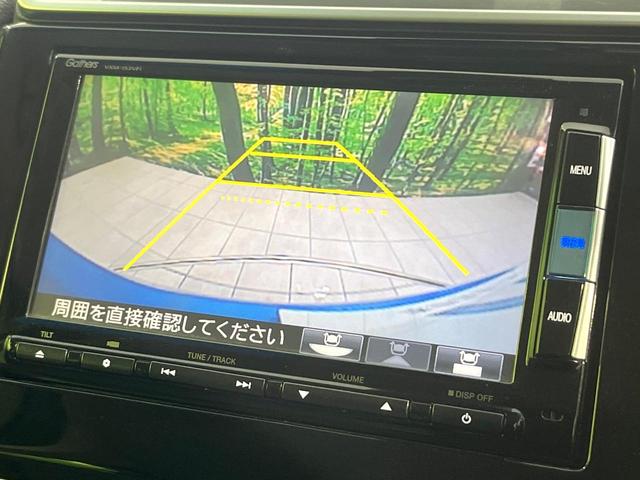 フィットハイブリッド Lパッケージ 禁煙車 純正ナビ バックカメラ 衝突軽減装置 ETC LEDヘッド Bluetooth クルコン ステアリングスイッチ スマートキー オートライト オートエアコン 横滑り防止装置 電動格納ミラー(4枚目)