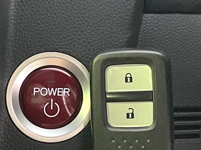 フィットハイブリッド Lパッケージ 禁煙車 純正ナビ バックカメラ 衝突軽減装置 ETC LEDヘッド Bluetooth クルコン ステアリングスイッチ スマートキー オートライト オートエアコン 横滑り防止装置 電動格納ミラー(7枚目)