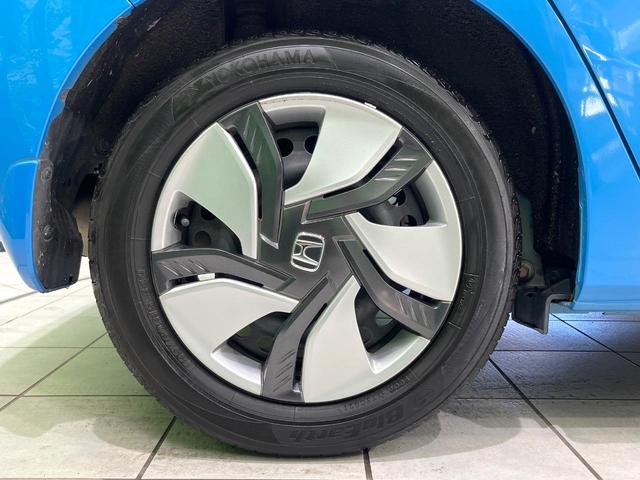 フィットハイブリッド Lパッケージ 禁煙車 純正ナビ バックカメラ 衝突軽減装置 ETC LEDヘッド Bluetooth クルコン ステアリングスイッチ スマートキー オートライト オートエアコン 横滑り防止装置 電動格納ミラー(23枚目)