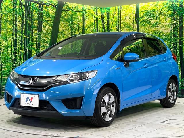 フィットハイブリッド Lパッケージ 禁煙車 純正ナビ バックカメラ 衝突軽減装置 ETC LEDヘッド Bluetooth クルコン ステアリングスイッチ スマートキー オートライト オートエアコン 横滑り防止装置 電動格納ミラー(27枚目)