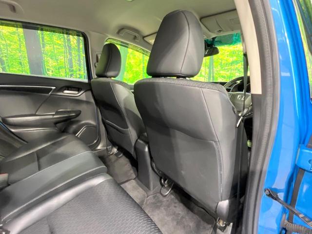 フィットハイブリッド Lパッケージ 禁煙車 純正ナビ バックカメラ 衝突軽減装置 ETC LEDヘッド Bluetooth クルコン ステアリングスイッチ スマートキー オートライト オートエアコン 横滑り防止装置 電動格納ミラー(34枚目)
