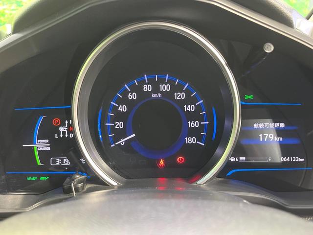 フィットハイブリッド Lパッケージ 禁煙車 純正ナビ バックカメラ 衝突軽減装置 ETC LEDヘッド Bluetooth クルコン ステアリングスイッチ スマートキー オートライト オートエアコン 横滑り防止装置 電動格納ミラー(45枚目)