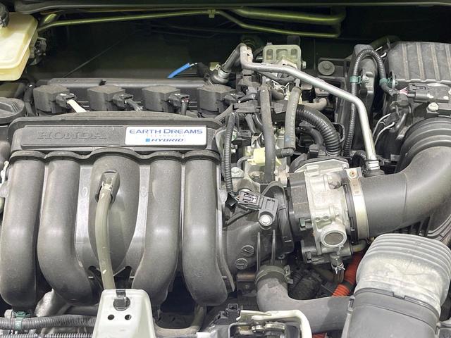 フィットハイブリッド Ｌパッケージ　純正ナビ　バックカメラ　衝突軽減装置　ハーフレザーシート　ＥＴＣ　Ｂｌｕｅｔｏｏｔｈ　フルセグ　ドラレコ　スマートキー　ＬＥＤヘッド　クルーズコントロール　ステアリングスイッチ　オートライト（18枚目）