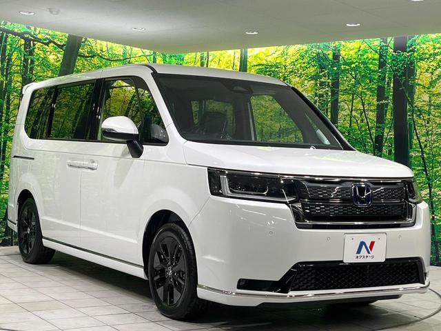 ステップワゴン ｅ：ＨＥＶスパーダ　登録済み未使用車　両側電動スライドドア　レーダークルーズ　電動リアゲート　ハーフレザーシート　コーナーセンサー　スマートキー　ＬＥＤヘッド　純正１６インチアルミ　オートライト　デュアルエアコン（17枚目）