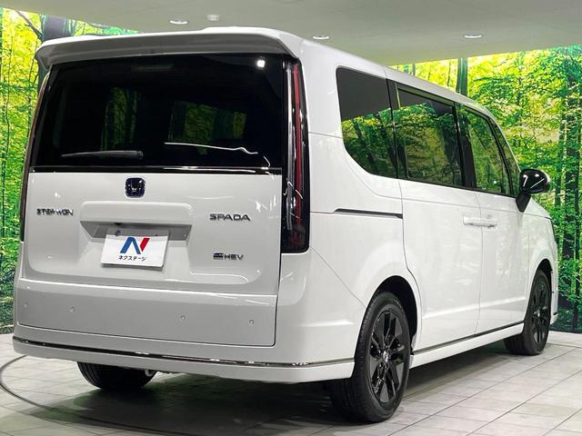 ステップワゴン ｅ：ＨＥＶスパーダ　登録済み未使用車　両側電動スライドドア　レーダークルーズ　電動リアゲート　ハーフレザーシート　コーナーセンサー　スマートキー　ＬＥＤヘッド　純正１６インチアルミ　オートライト　デュアルエアコン（18枚目）