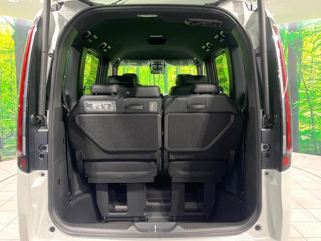 ステップワゴン ｅ：ＨＥＶスパーダ　登録済み未使用車　両側電動スライドドア　レーダークルーズ　電動リアゲート　ハーフレザーシート　コーナーセンサー　スマートキー　ＬＥＤヘッド　純正１６インチアルミ　オートライト　デュアルエアコン（30枚目）