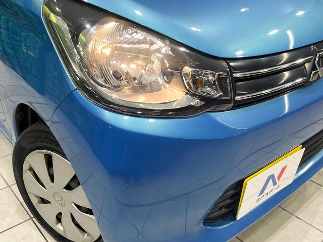 ｅＫワゴン Ｍ　禁煙車　純正ナビ　ＥＴＣ　オートエアコン　Ｂｌｕｅｔｏｏｔｈ　アイドリングストップ　キーレスエントリー　電動格納ミラー　ＣＤ　ＤＶＤ　プライバシーガラス　盗難防止システム　衝突安全ボディ（12枚目）