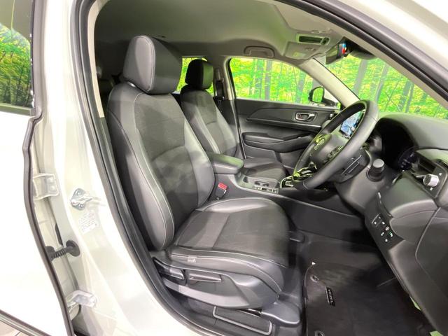 ヴェゼル ｅ：ＨＥＶ　Ｚ　禁煙車　純正９型ナビ　衝突軽減　バックカメラ　レーダークルーズ　ステアリングヒーター　ＥＴＣ　ドラレコ　シートヒーター　電動リアゲート　クリアランスソナー　オートハイビーム　置くだけ充電　スマートキー（8枚目）