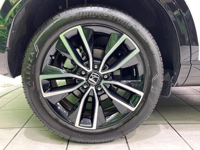 ヴェゼル ｅ：ＨＥＶ　Ｚ　禁煙車　純正９型ナビ　衝突軽減　バックカメラ　レーダークルーズ　ステアリングヒーター　ＥＴＣ　ドラレコ　シートヒーター　電動リアゲート　クリアランスソナー　オートハイビーム　置くだけ充電　スマートキー（27枚目）