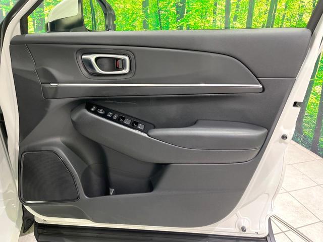 ヴェゼル ｅ：ＨＥＶ　Ｚ　禁煙車　純正９型ナビ　衝突軽減　バックカメラ　レーダークルーズ　ステアリングヒーター　ＥＴＣ　ドラレコ　シートヒーター　電動リアゲート　クリアランスソナー　オートハイビーム　置くだけ充電　スマートキー（35枚目）