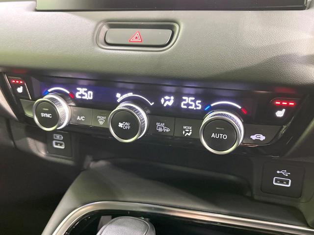 ヴェゼル ｅ：ＨＥＶ　Ｚ　禁煙車　純正９型ナビ　衝突軽減　バックカメラ　レーダークルーズ　ステアリングヒーター　ＥＴＣ　ドラレコ　シートヒーター　電動リアゲート　クリアランスソナー　オートハイビーム　置くだけ充電　スマートキー（50枚目）