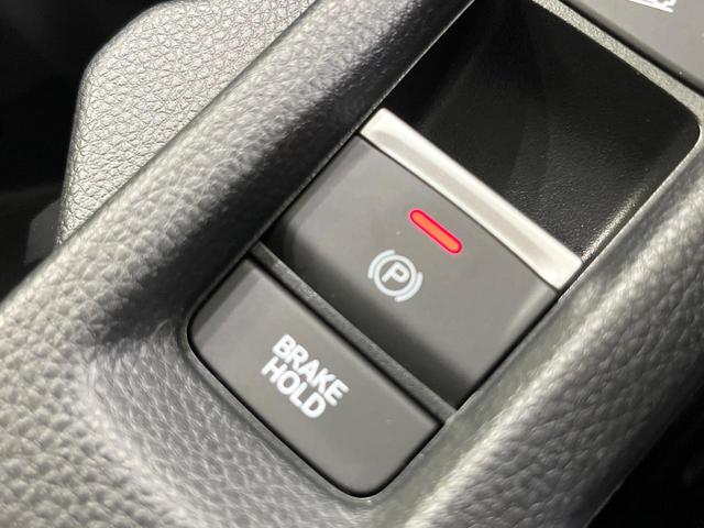 ヴェゼル ｅ：ＨＥＶ　Ｚ　禁煙車　純正９型ナビ　衝突軽減　バックカメラ　レーダークルーズ　ステアリングヒーター　ＥＴＣ　ドラレコ　シートヒーター　電動リアゲート　クリアランスソナー　オートハイビーム　置くだけ充電　スマートキー（58枚目）