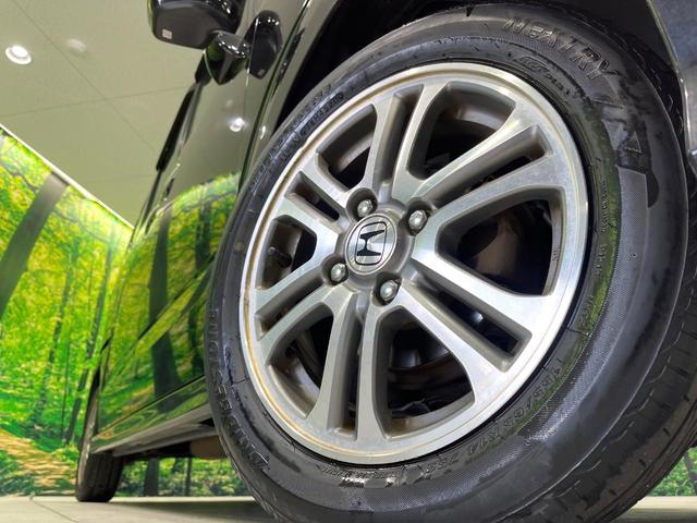 Ｎ－ＢＯＸカスタム Ｇ・Ｌパッケージ　禁煙車　ＳＤナビ　バックカメラ　ドラレコ　ＨＩＤヘッド　ＥＴＣ　純正１４インチアルミ　オートエアコン　Ｂｌｕｅｔｏｏｔｈ　ＤＶＤ再生　フルセグ　ＨＩＤフォグ　プライバシーガラス　ドアバイザー（13枚目）