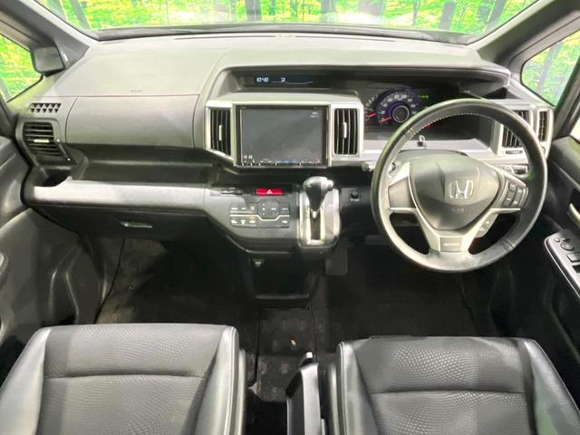 ステップワゴンスパーダ Ｚ　クールスピリット　禁煙車　９型純正ナビ　両側電動ドア　後席モニター　バックカメラ　ＨＩＤヘッド　ビルトインＥＴＣ　クルコン　純正１７インチアルミ　オートライト　オートエアコン　Ｂｌｕｅｔｏｏｔｈ　ＣＤ　ＤＶＤ再生（2枚目）