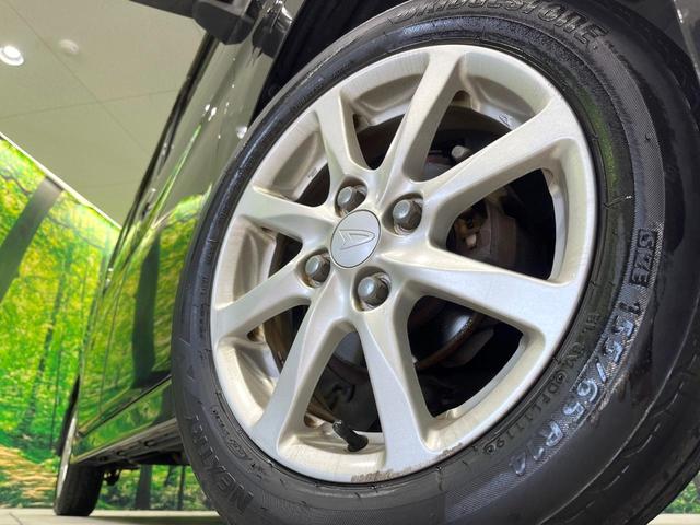 タント カスタムＬ　禁煙車　ＳＤナビ　スマートキー　ＨＩＤヘッド　純正１４インチアルミ　オートライト　オートエアコン　ＣＤ　ＤＶＤ再生　地デジ　ドアバイザー　プライバシーＧ　盗難防止システム（12枚目）