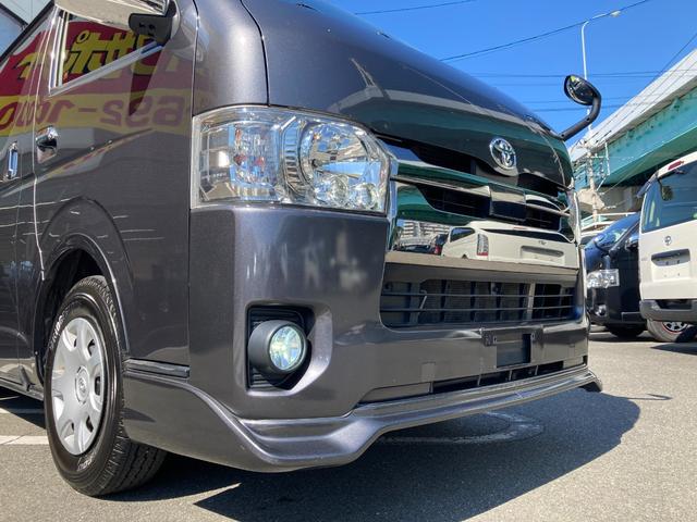 ハイエースバン スーパーＧＬ　ダークプライムＩＩ　４ＷＤ・パワーバックドア・寒冷地仕様・トヨタセーフティセンス・ＬＥＤヘッドライト・プッシュスタート・トムスＬＥＤテールランプ・フロントスポイラー・オーバーフェンダー・クルコン・バックカメラ・ＳＤナビ（7枚目）