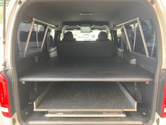 ハイエースバン ロングワイドスーパーGL ダークプライム2・6型・パワースライドドア・アルパインBIGX11・フリップダウンモニター・ベッドキット・ユーアイビークルスライドフロア・デジタルインナーミラー・パノラミックビュー・クリアランスソナー(53枚目)