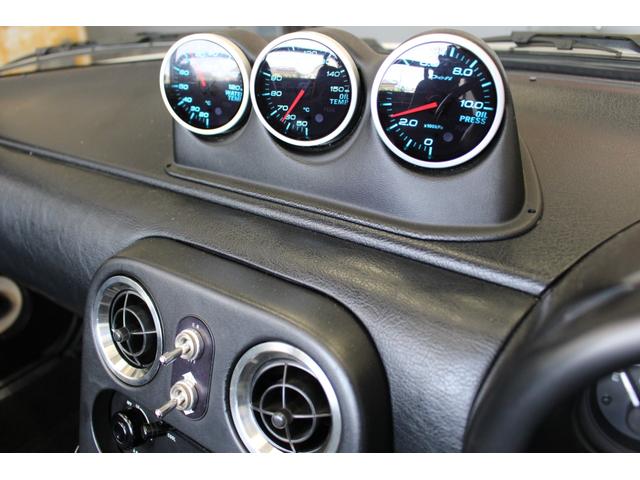 ユーノスロードスター １．６Ｓスペシャル　５速・デニム生地幌・マキシムワークスＥＸマニ・マフラー・ＴＥＩＮ車高調・ＲＡＹＳ１４インチアルミ・Ｄｅｆｉ追加メーター・軽量トランクリッド・パワーウインドウレス・保証書／取説／スペアキー有（35枚目）