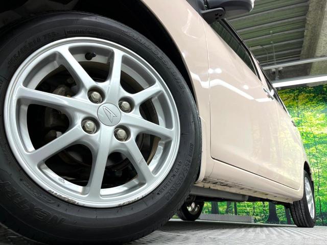 G 禁煙車 純正14インチアルミ オートエアコン アイドリングストップ 革巻きステアリング シートリフター 純正CDオーディオ ウィンカーミラー セキュリティアラーム プライバシーガラス ドアバイザー(13枚目)