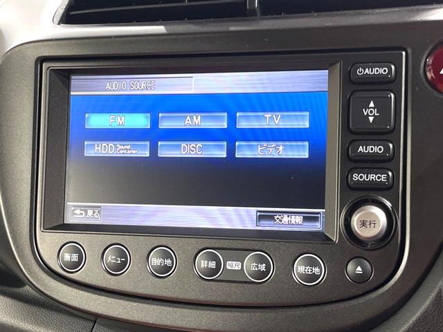 フィットハイブリッド ＲＳ　純正ナビ　禁煙車　クルコン　バックカメラ　ＥＴＣ　ＨＩＤヘッドライト　オートライト　オートエアコン　スマートキー　革巻きステアリング　純正１６インチアルミホイール　プライバシーガラス　電動格納ミラー（53枚目）