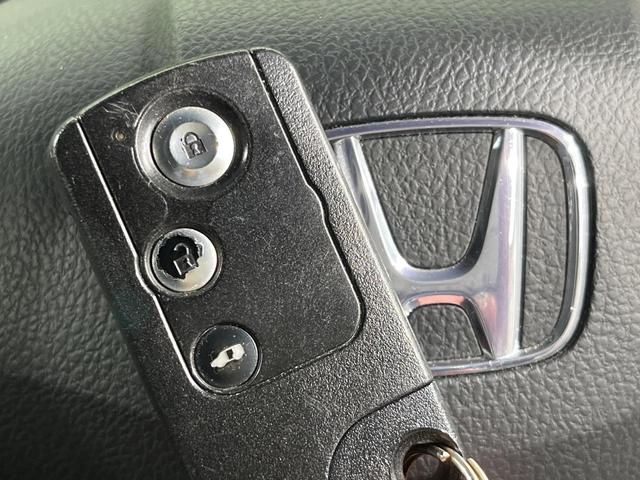 フリードスパイク Ｇ　エアロ　電動スライドドア　ＳＤナビ　禁煙車　スマートキー　ＨＩＤヘッド　ＥＴＣ　オートライト　オートエアコン　純正１５インチアルミ　ＣＤ　ＤＶＤ再生　フルセグ（7枚目）